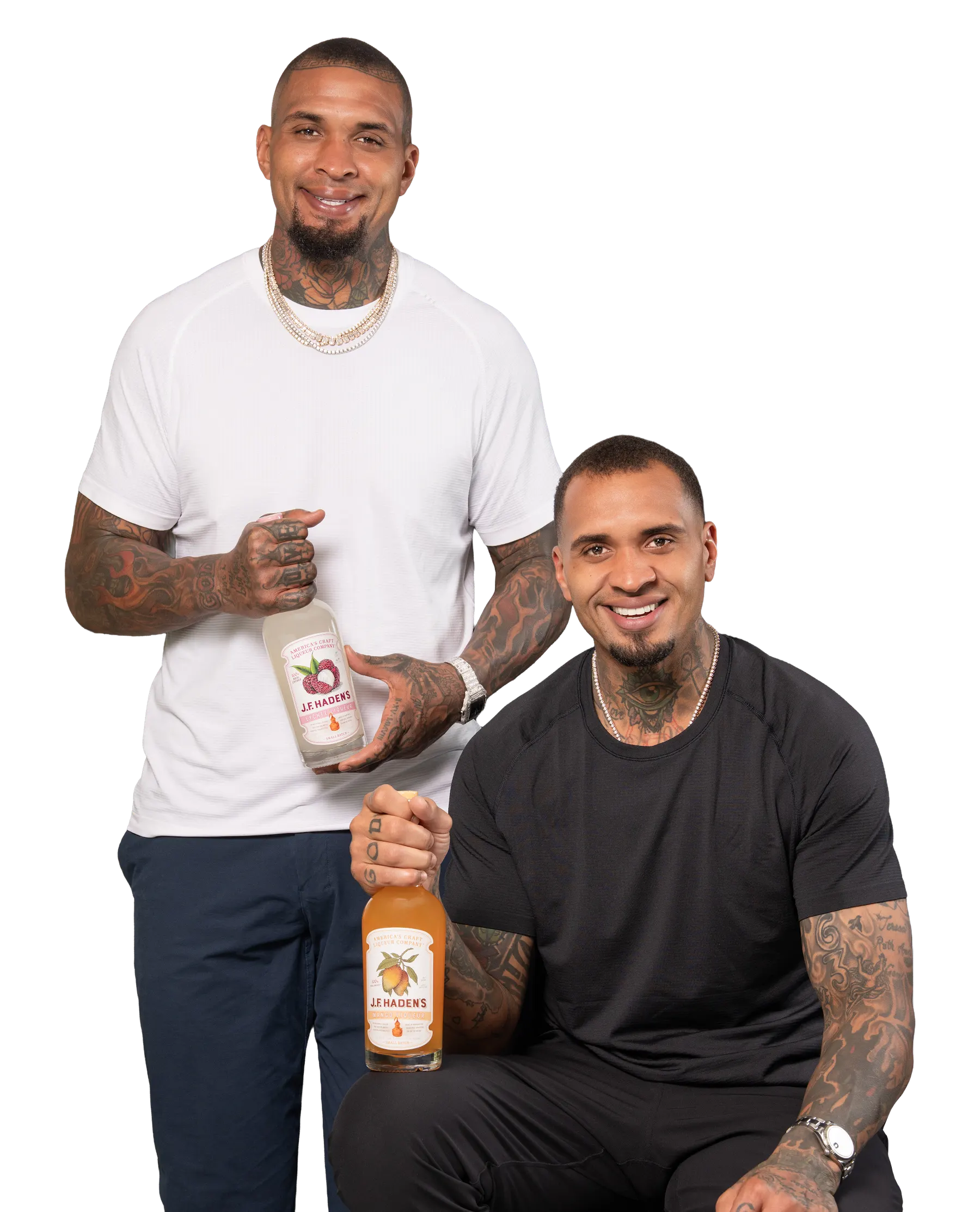 Mike and Maurkice Pouncey with bottles of J.F. Haden’s Mango and Lychee Liqueur
